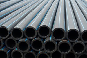 A stack of HDPE pipe