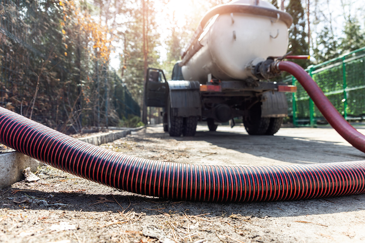 suction hose attached to truck