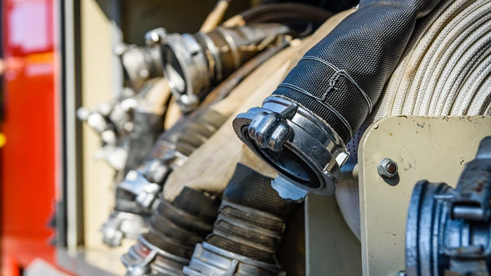 Fire hoses with couplings used for industrial water transfer and firefighting applications