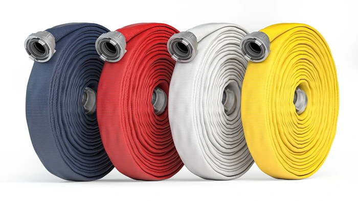 Rolled-up fire hoses in blue, red, white, and yellow with couplings for connection