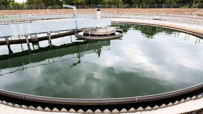 Circular clarifier tank in a wastewater treatment plant