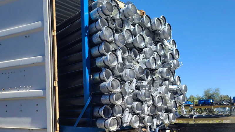 Aluminum cam and groove hose couplings stacked for shipment