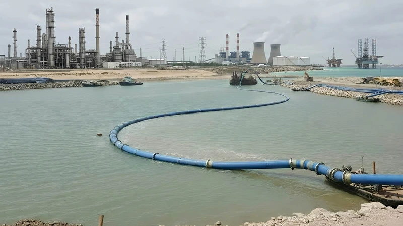 Floating pipeline in a marine industrial setting used for dredging