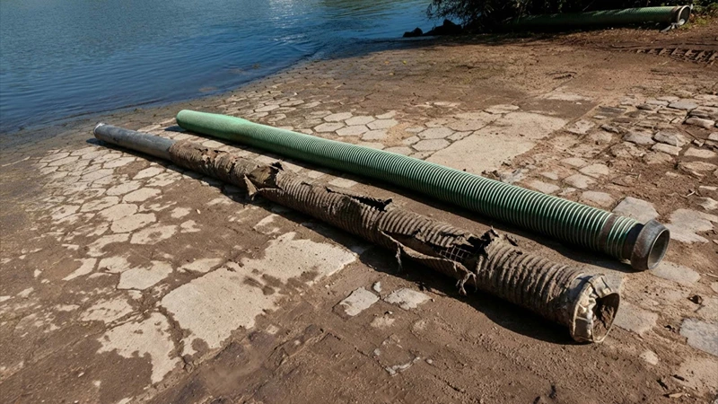 Abrasive slurry hose system facing rapid wear, tight routing, and alignment challenges