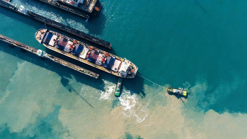 Aerial view of a mining operation with mountains around