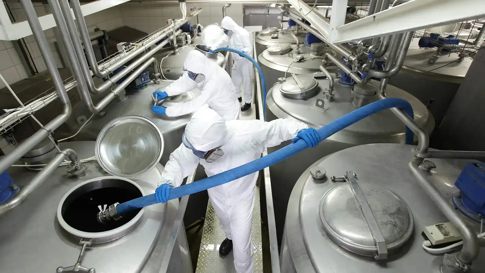 Chemical processing plant where durable piping and hose systems handle aggressive fluids and corrosive process conditions with long-term reliability