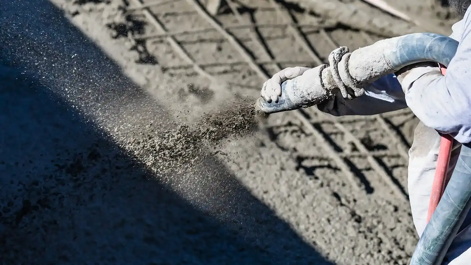 Active construction site using HDPE pipe and hose for dewatering, site preparation, and material transfer on a fast-moving jobsite