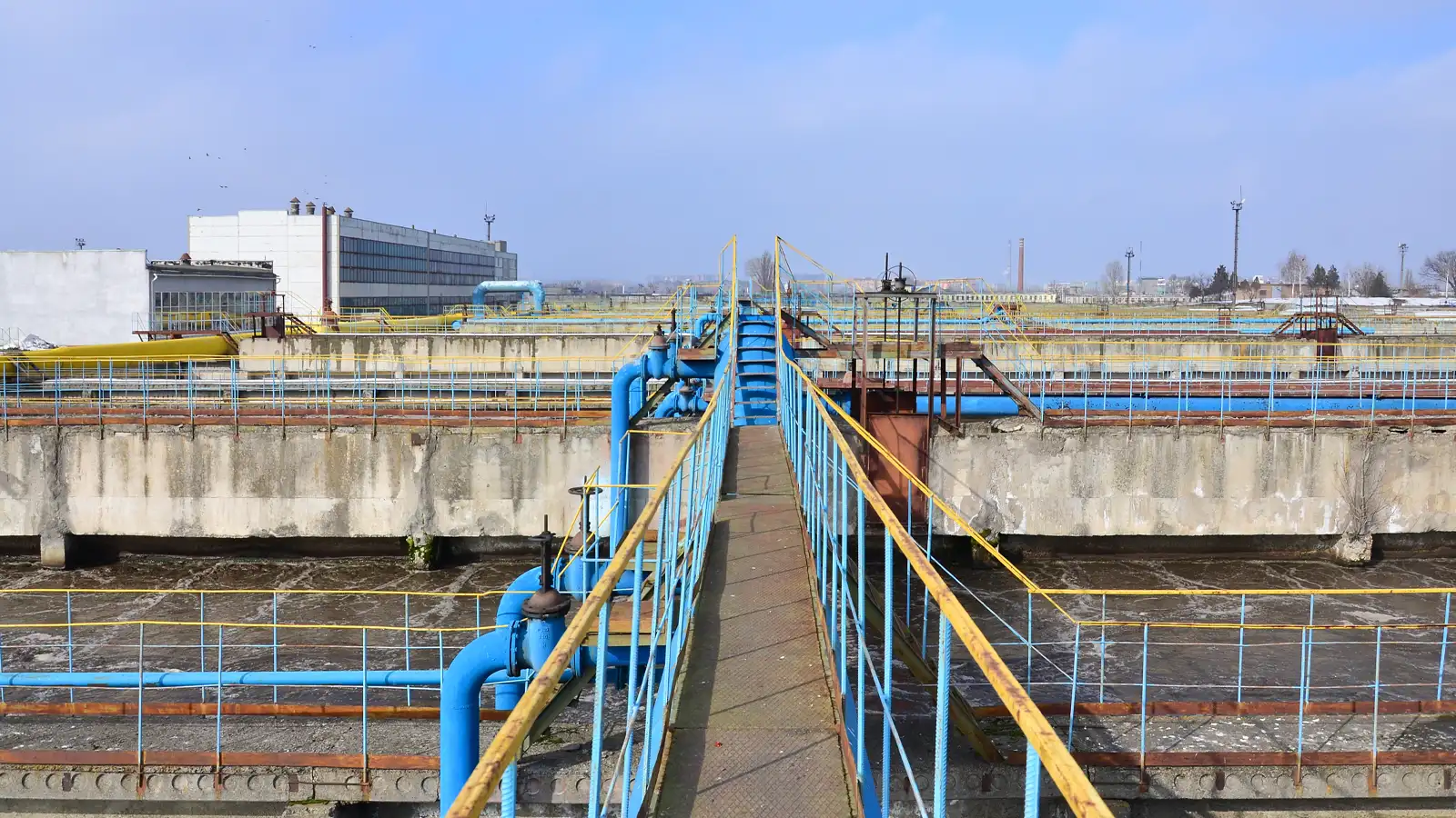 Large marine crane barge on a self-elevating platform facing complex slurry discharge needs.