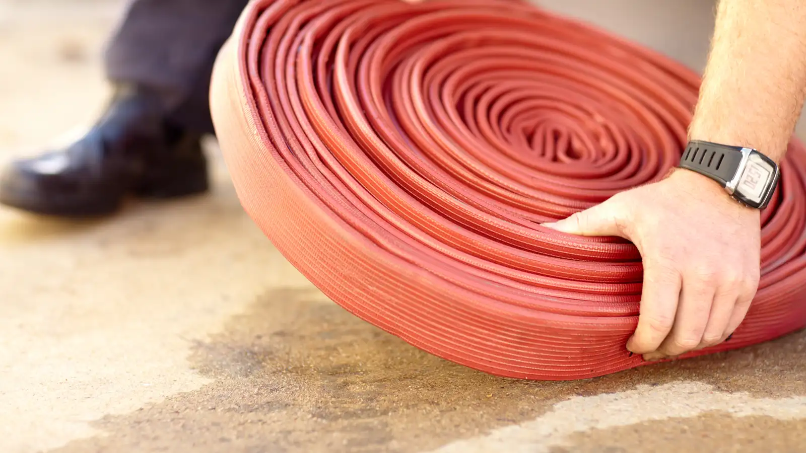 Beach nourishment dredging project utilizing offshore vessels and high-diameter discharge pipes.