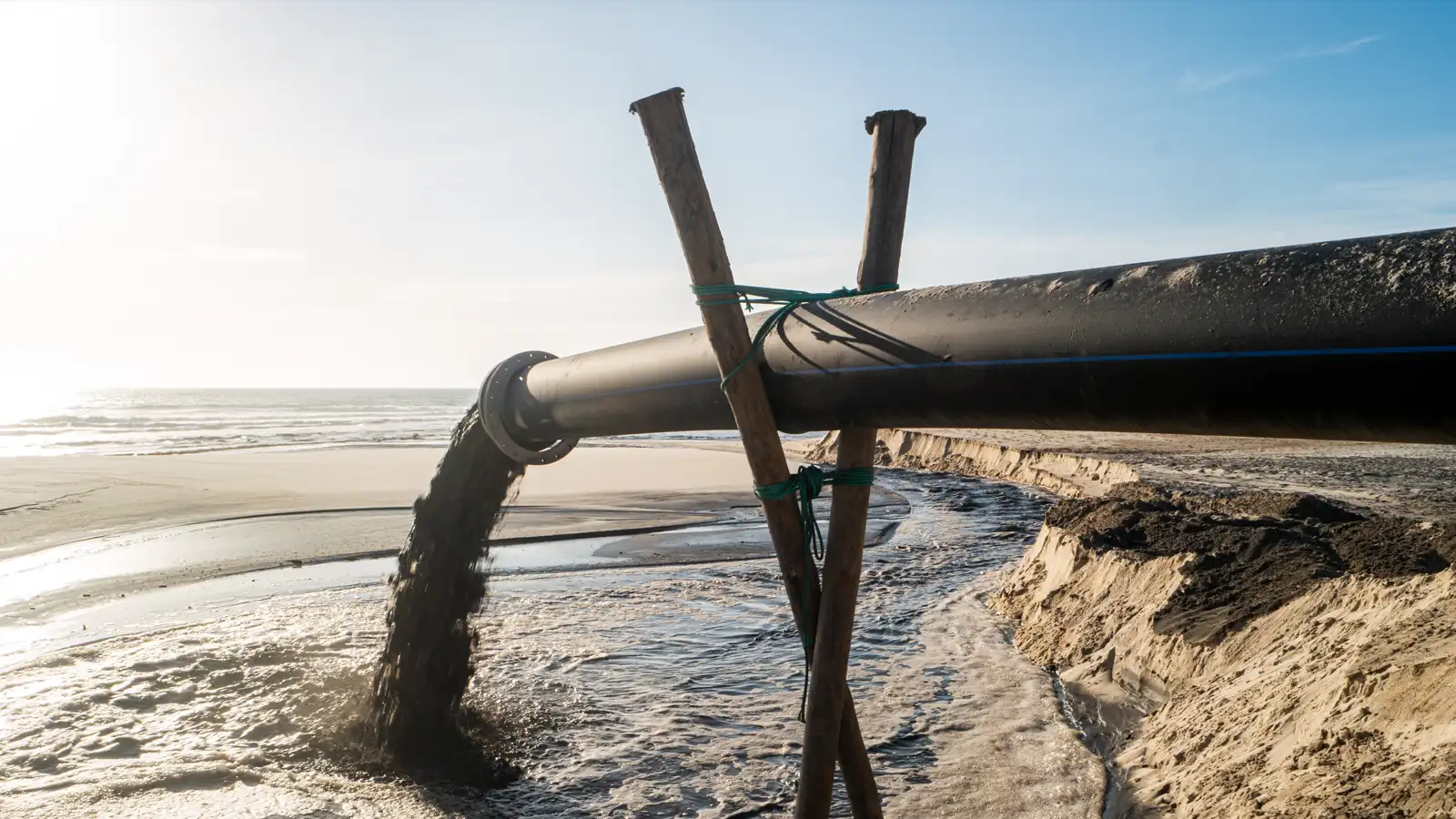 12-inch abrasion-resistant slurry discharge hoses with ANSI flanged connections installed