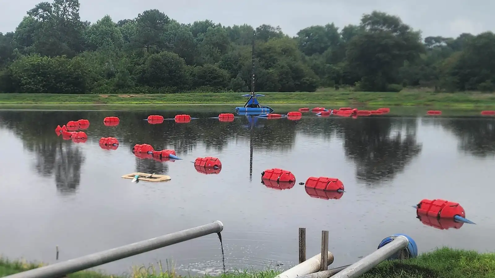 Hose floats keeping lay flat irrigation intake hose suspended at the water surface of a farm pond or reservoir to prevent sediment ingestion and maintain consistent pump suction