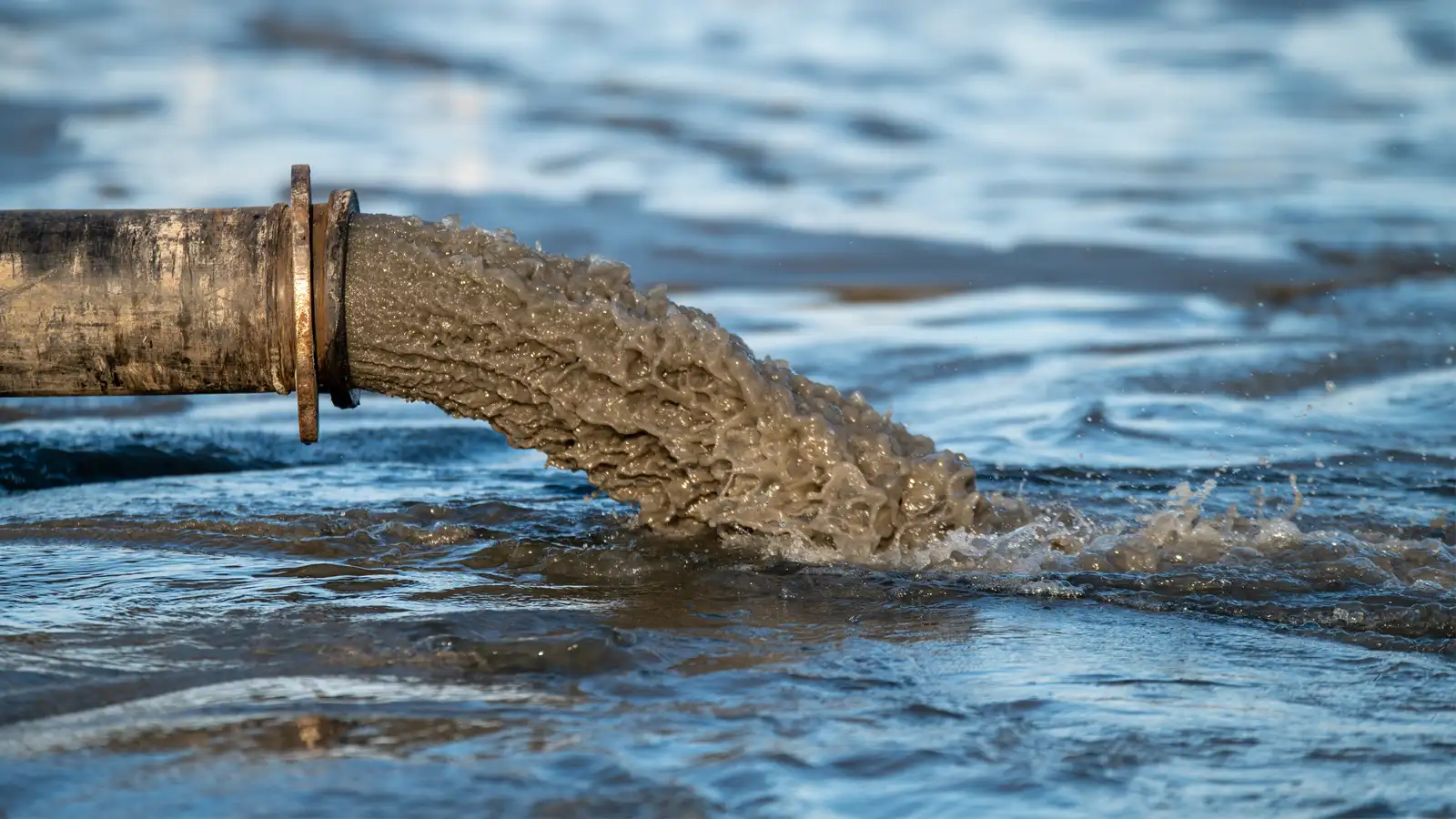 Upgraded cooling water pipeline system in power plant showing improved flow capacity, reduced corrosion, and efficient fluid conveyance