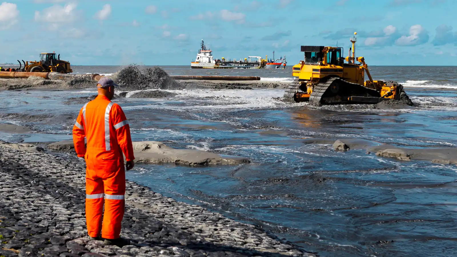 Large marine crane barge on a self-elevating platform facing complex slurry discharge needs.