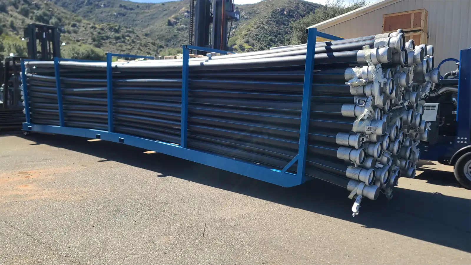 Beach nourishment dredging project utilizing offshore vessels and high-diameter discharge pipes.