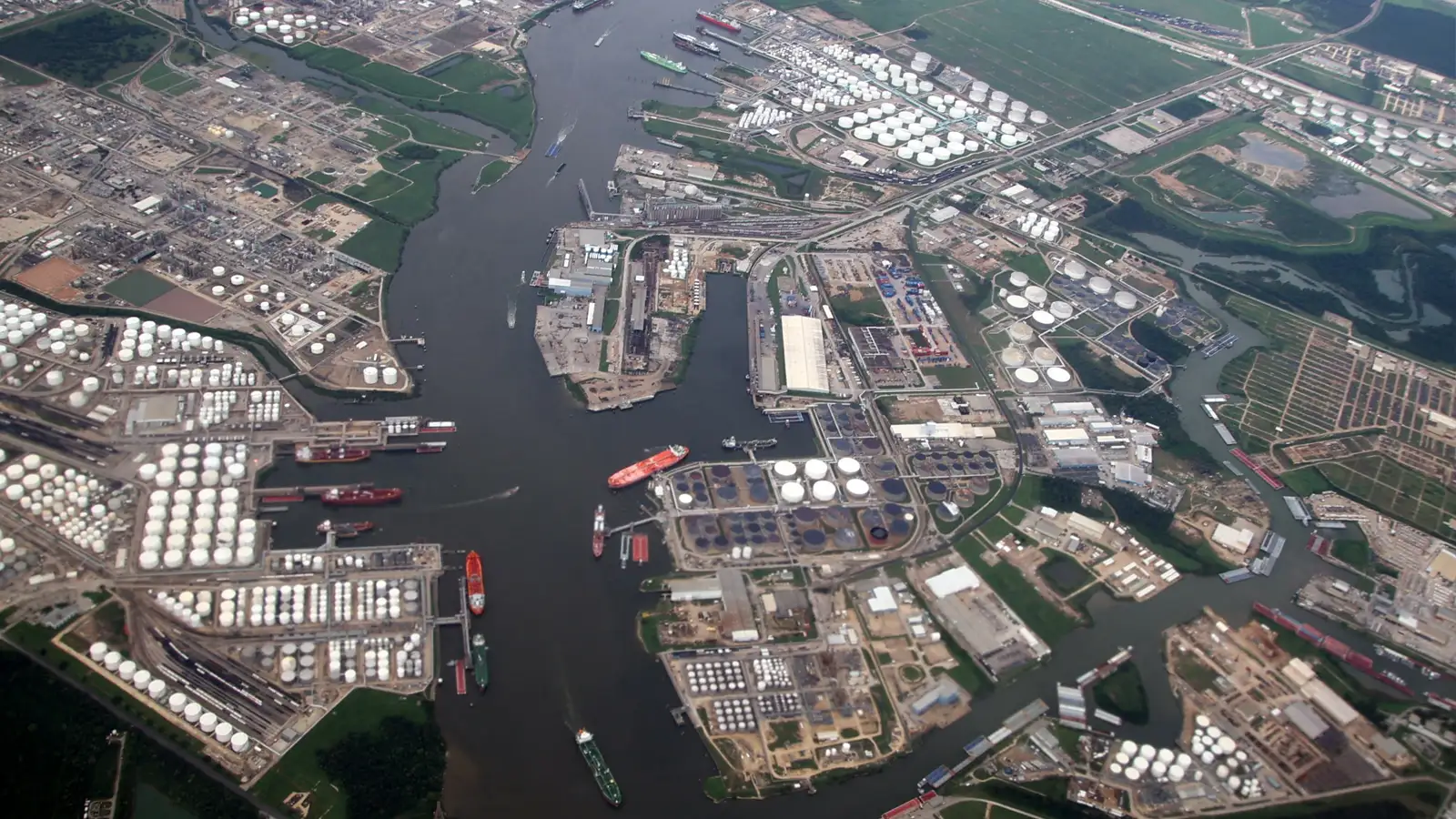 Aerial view of a mining operation with mountains around